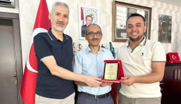 38 yıllık hizmete teşekkür plaketi