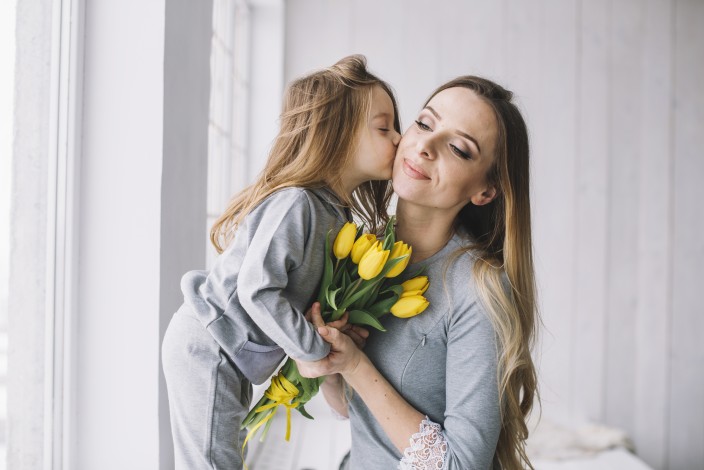 mothers-day-concept-with-daughter-kissing-mother.jpg