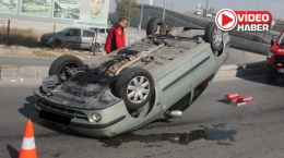 Polis memurunun kullandığı otomobil takla attı